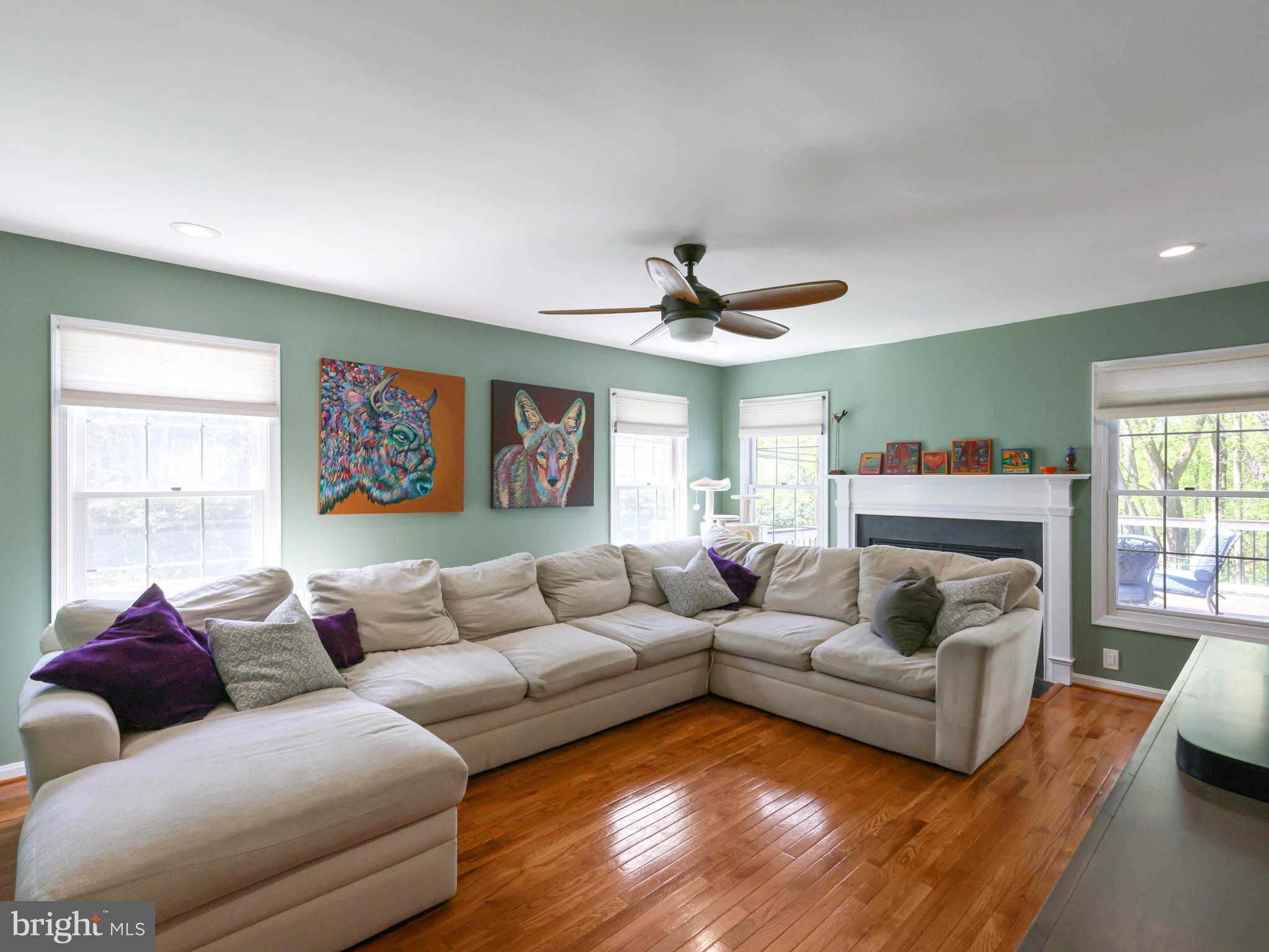 18500 Gingerbread Lane Gaithersburg, MD 20877 - Photo 19 of 56 a living room with furniture and a large window