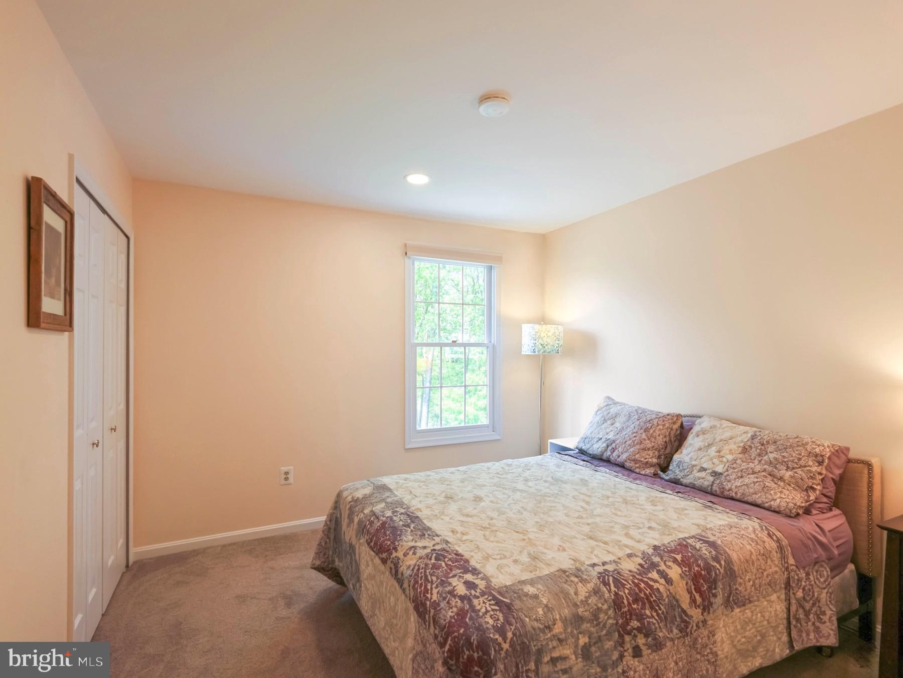 18500 Gingerbread Lane Gaithersburg, MD 20877 - Photo 38 of 56 a bedroom with a bed and a window