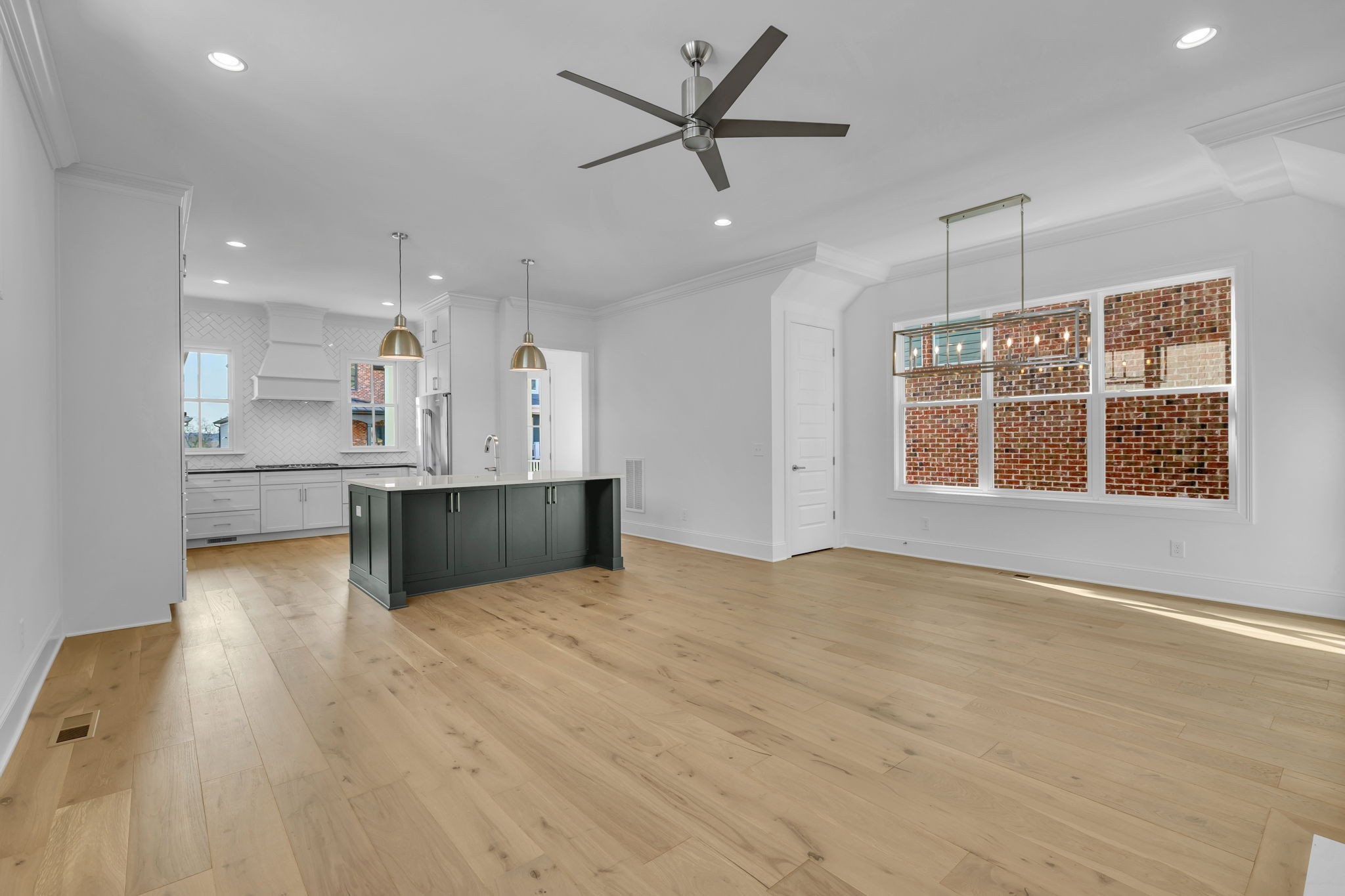 2018 Nathaniel Road Franklin, TN 37064 - Photo 16 of 52 a view of an empty room with kitchen appliances and a window