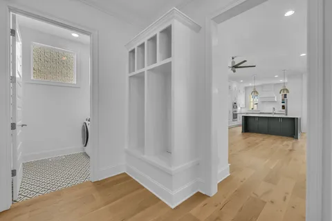 a view of a bathroom with sink and mirror
