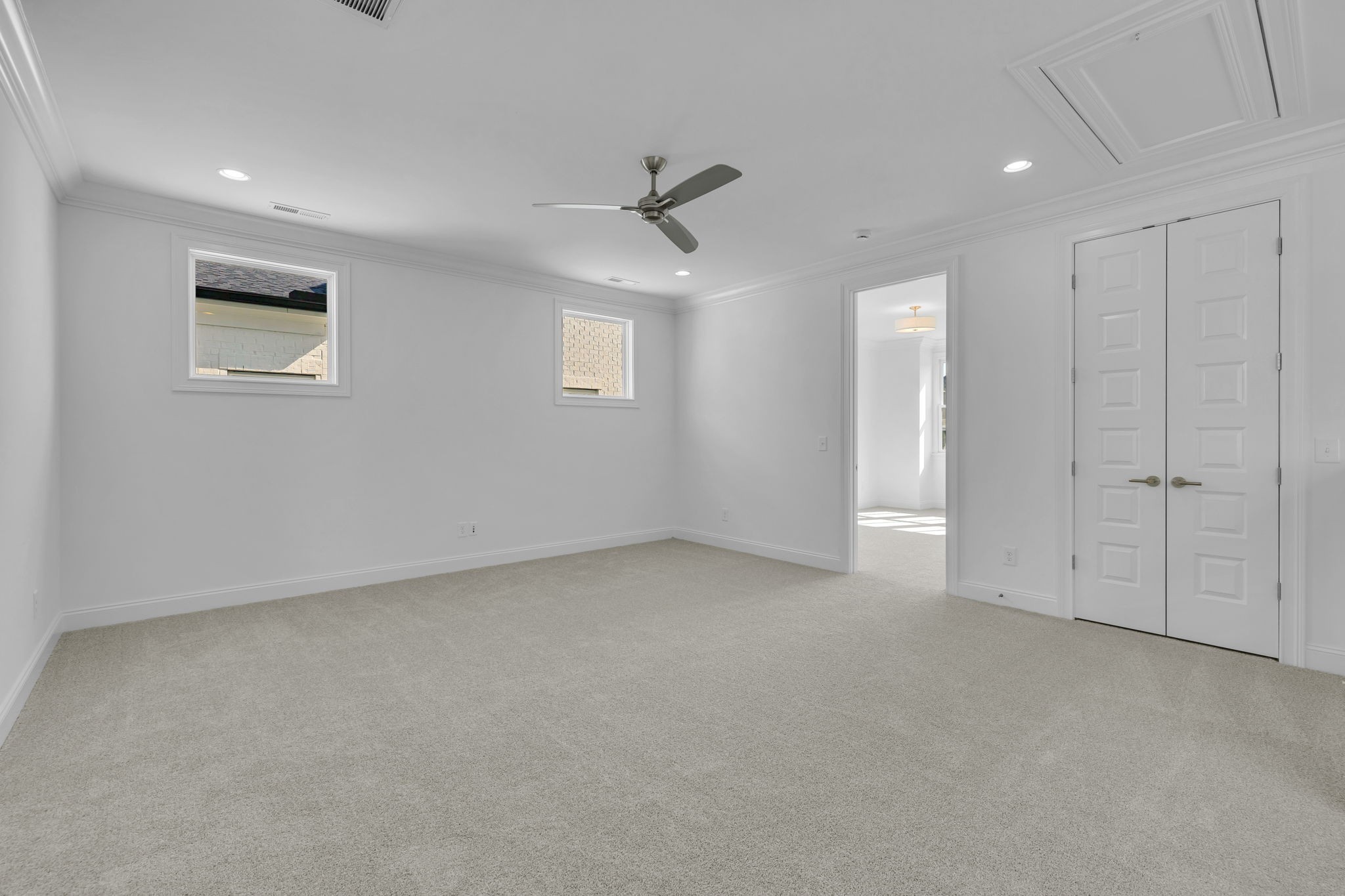 2018 Nathaniel Road Franklin, TN 37064 - Photo 26 of 52 an empty room with a ceiling fan & windows