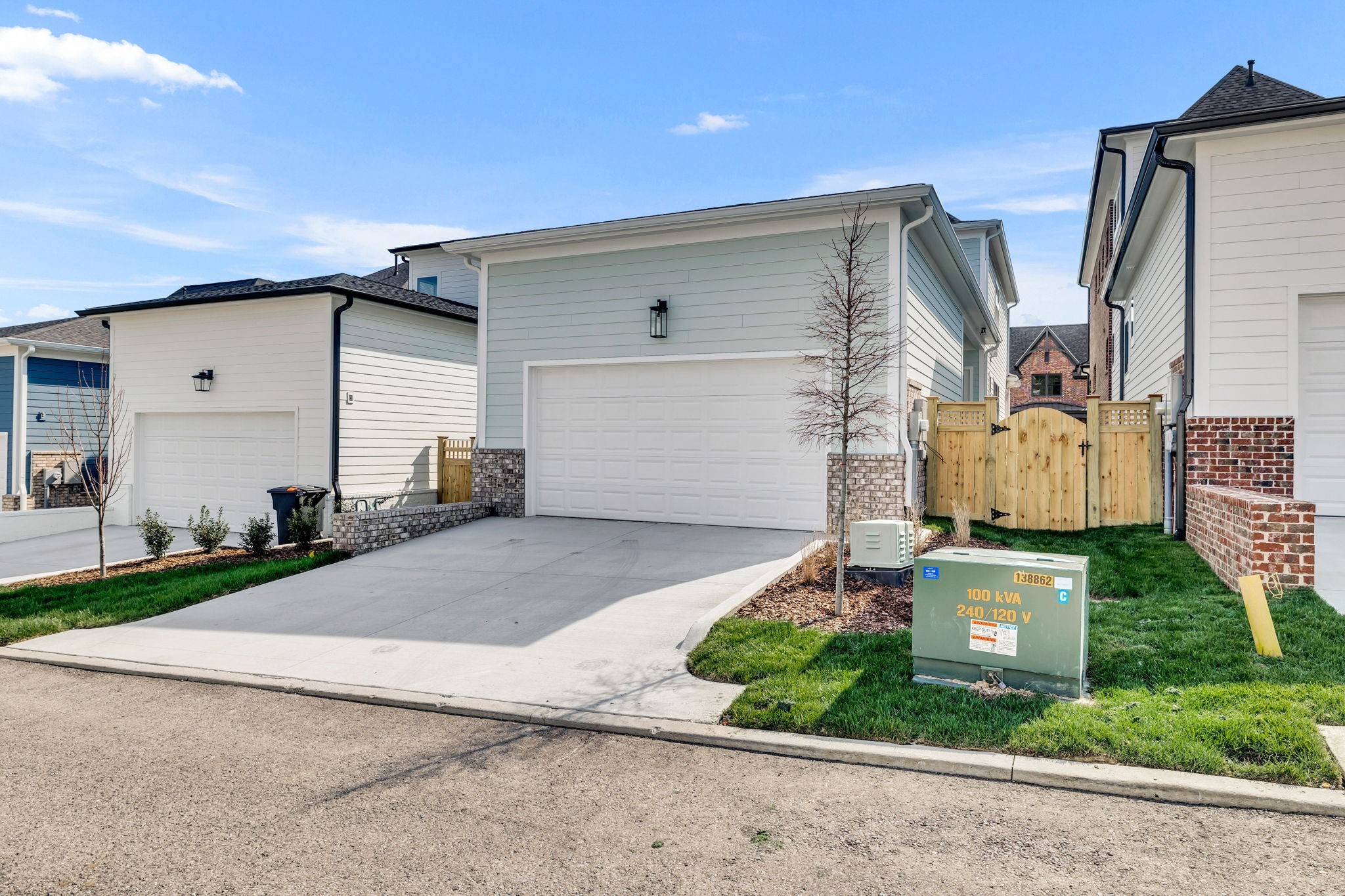 2018 Nathaniel Road Franklin, TN 37064 - Photo 35 of 52 a front view of a house with a yard and garage