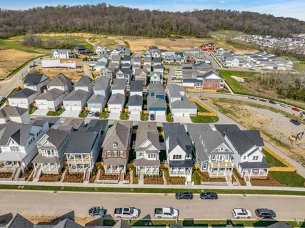 an aerial view of a house with a garden