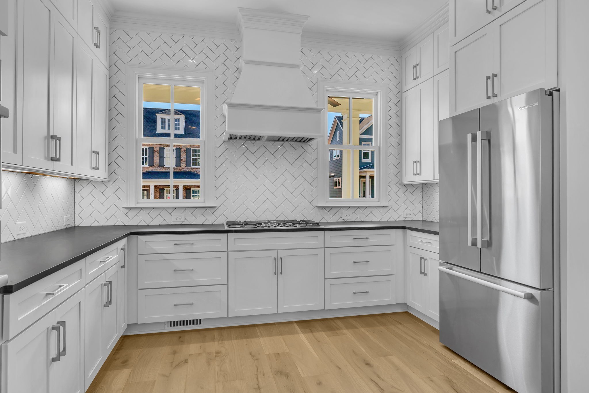 2018 Nathaniel Road Franklin, TN 37064 - Photo 9 of 52 a kitchen with stainless steel appliances a refrigerator sink and cabinets