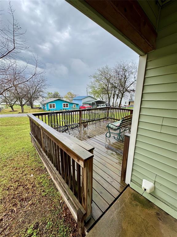 508 Sherry Street Quinlan, TX 75474 - Photo 15 of 20 a view of balcony with wooden floor