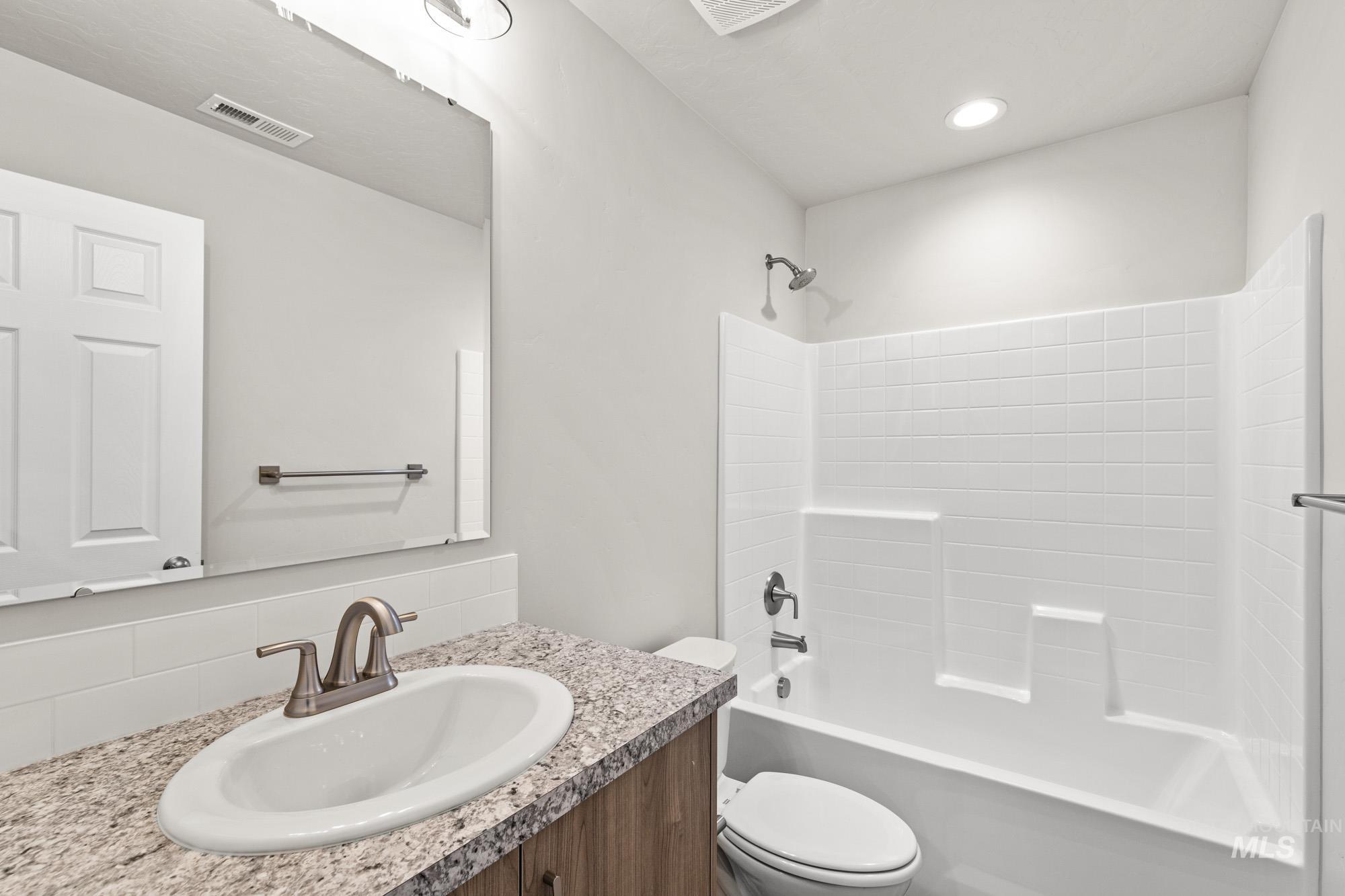 1515 Long Pond Street Middleton, ID 83644 - Photo 21 of 25 Full bath featuring bathtub / shower combination and vanity