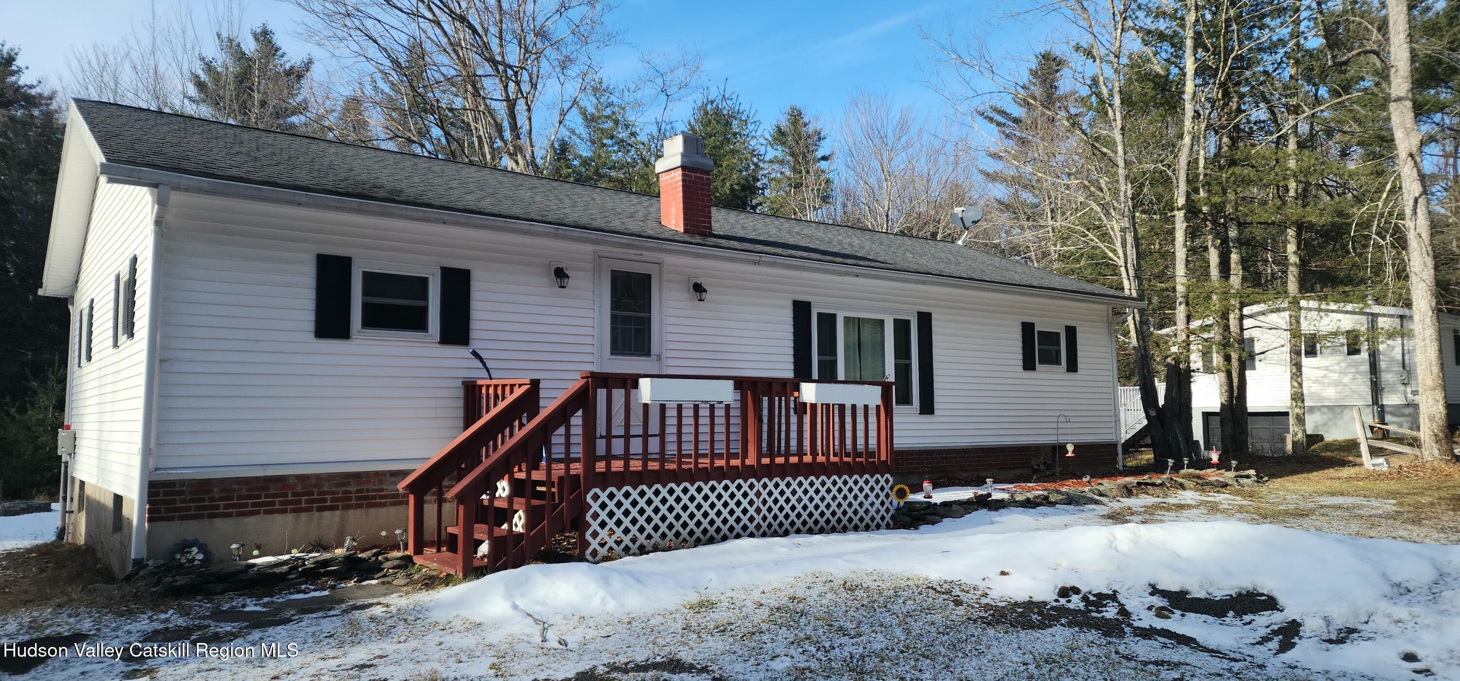 315 Begley Road Windham, NY 12496 - Photo 22 of 22 a view of a house with a wooden fence