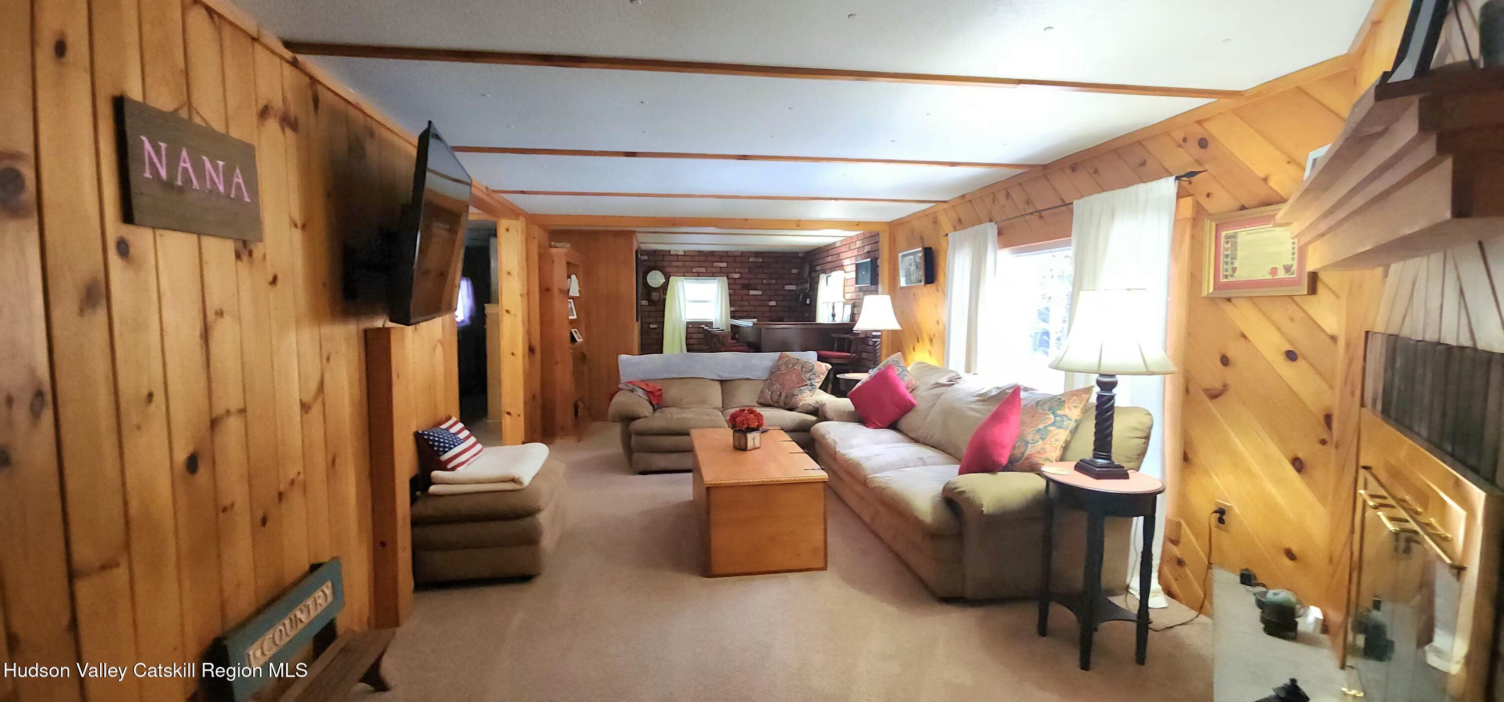 315 Begley Road Windham, NY 12496 - Photo 4 of 22 a living room with furniture and a window