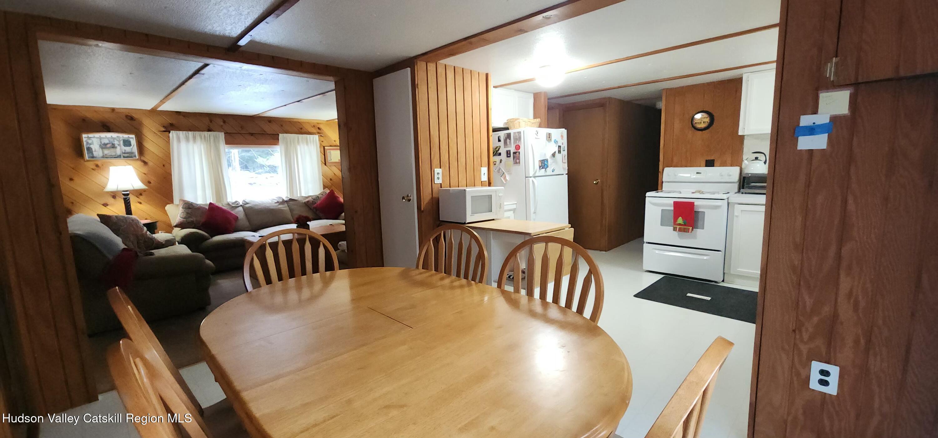 315 Begley Road Windham, NY 12496 - Photo 7 of 22 a view of a dining room with furniture