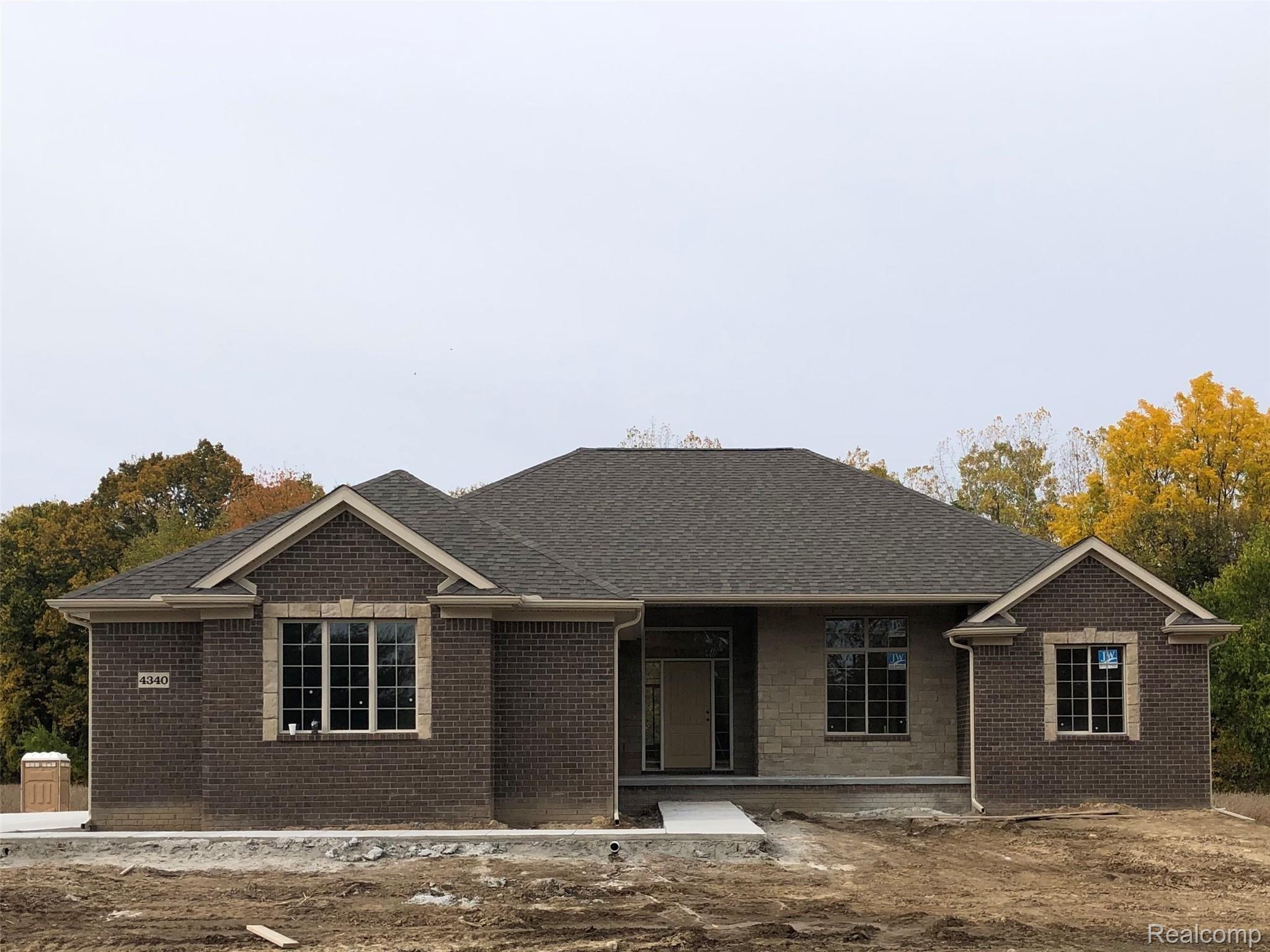 4340 Howland Road Almont, MI 48003 - Photo 1 of 6 Front elevation of new home under construction