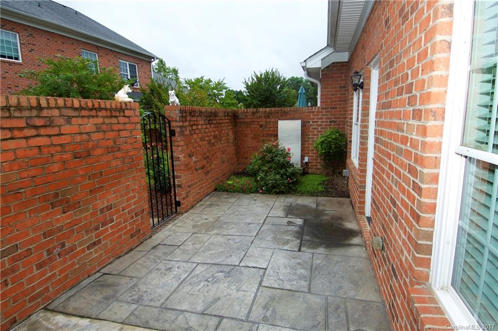 708 Congressional Lane, Unit D Fort Mill, SC 29708 - Photo 14 of 14 a view of a pathway along a brick building