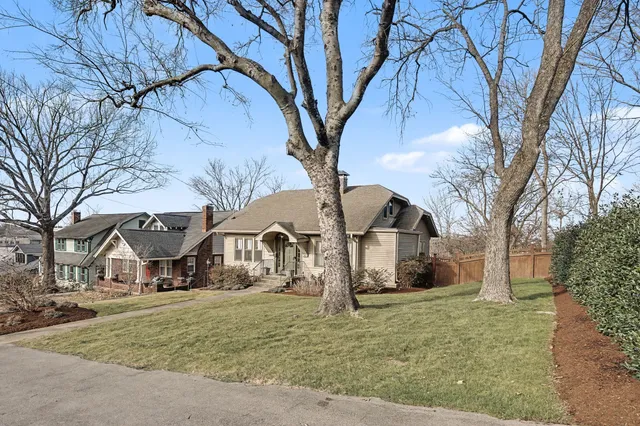 a living room with furniture or couch and a large window
