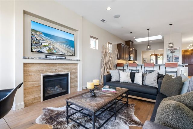 a spacious bathroom with a granite countertop tub sink a mirror a shower and vanity