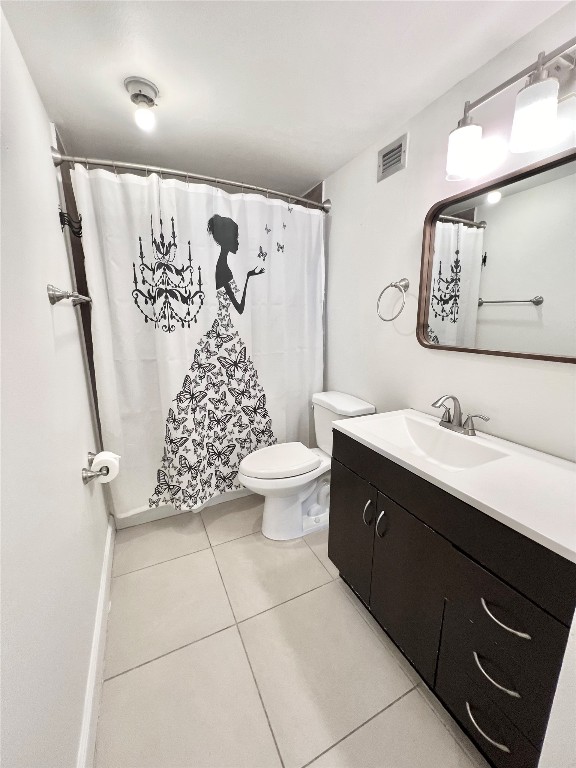 2016 Main Street, Unit 2405 Houston, TX 77002 - Photo 19 of 40 a bathroom with a sink toilet and shower