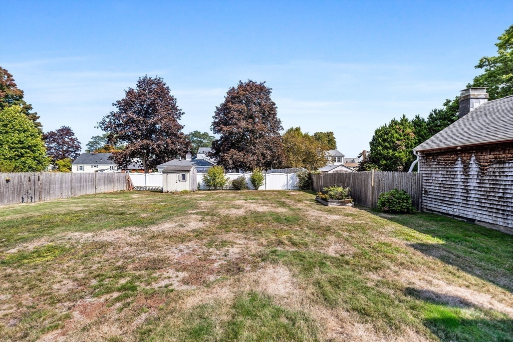 24 River Street, Unit B Danvers, MA 01923 - Photo 22 of 28 a view of backyard with green space