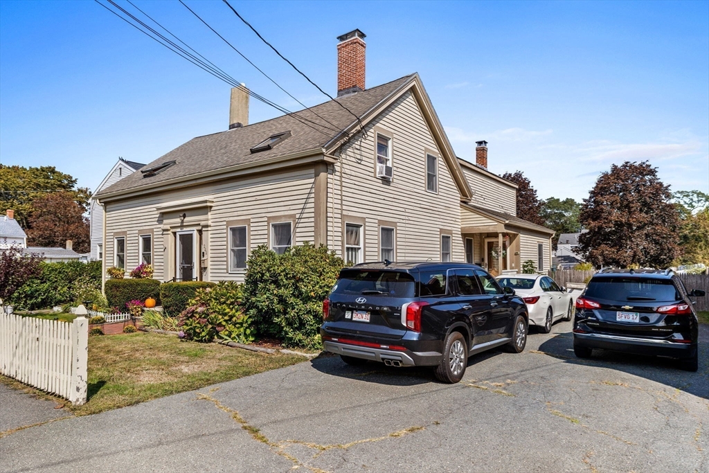 24 River Street, Unit B Danvers, MA 01923 - Photo 26 of 28 a view of a car parked in front of a house