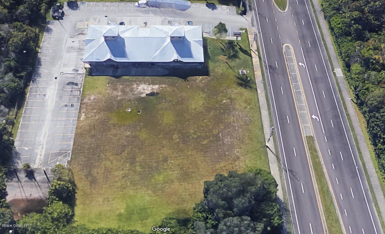 5015 Babcock Street Northeast Palm Bay, FL 32905 - Photo 6 of 8 a bathroom with a bathtub