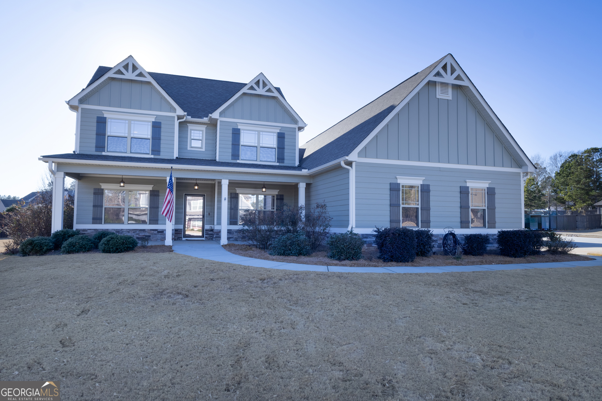 100 Wet Stone Road Senoia, GA 30276 - Photo 1 of 54 a front view of a house with a yard