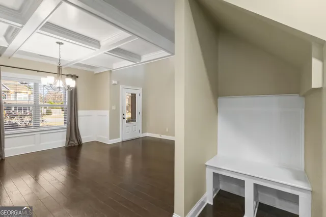 a view of a livingroom with wooden floor