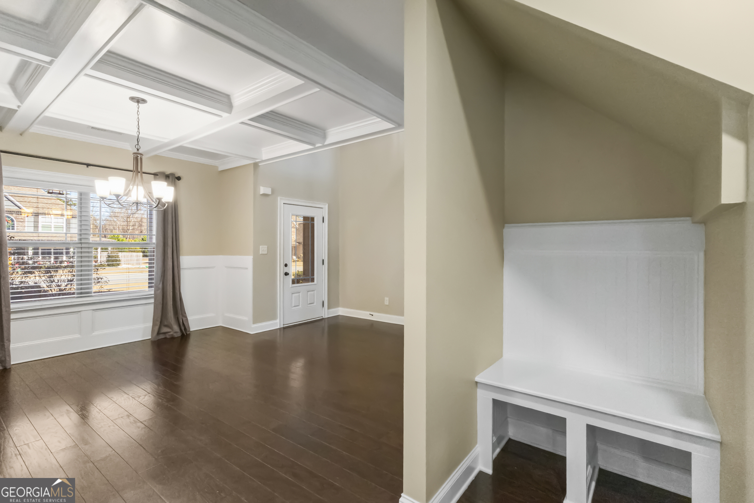 100 Wet Stone Road Senoia, GA 30276 - Photo 11 of 54 a view of an empty room with wooden floor and a window