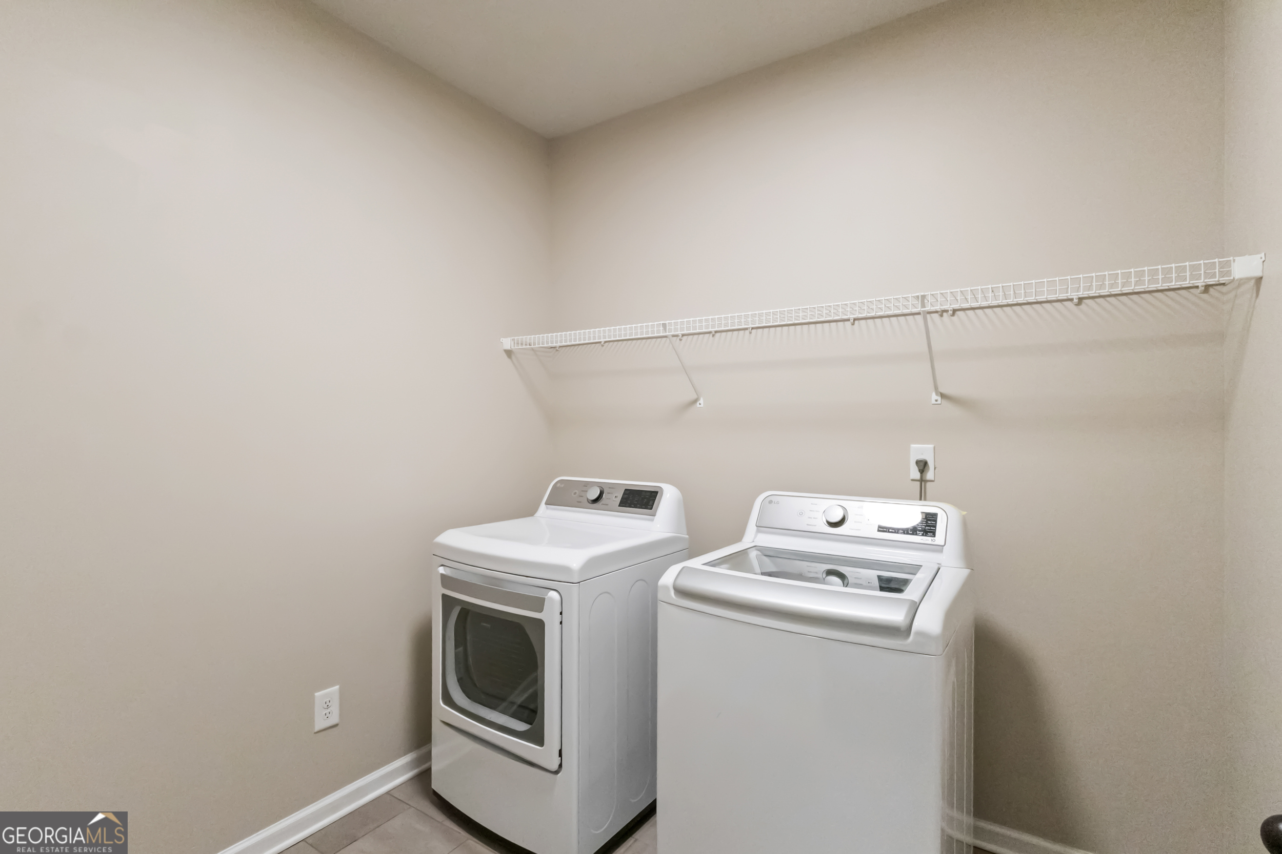 100 Wet Stone Road Senoia, GA 30276 - Photo 13 of 54 a utility room with dryer and washer