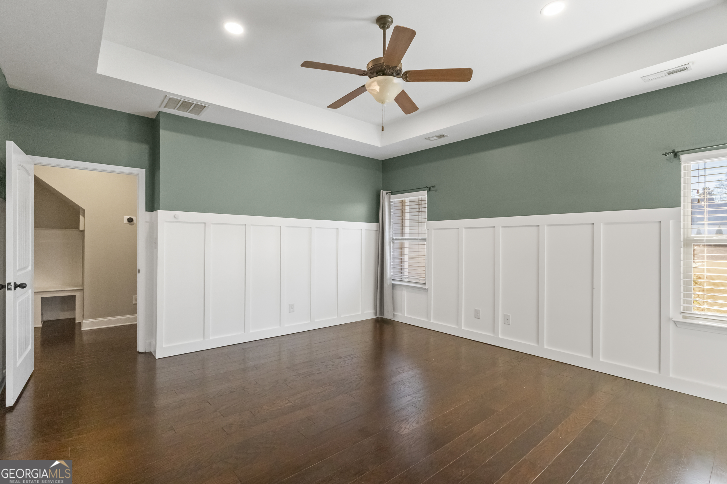 100 Wet Stone Road Senoia, GA 30276 - Photo 14 of 54 a view of an empty room with wooden floor
