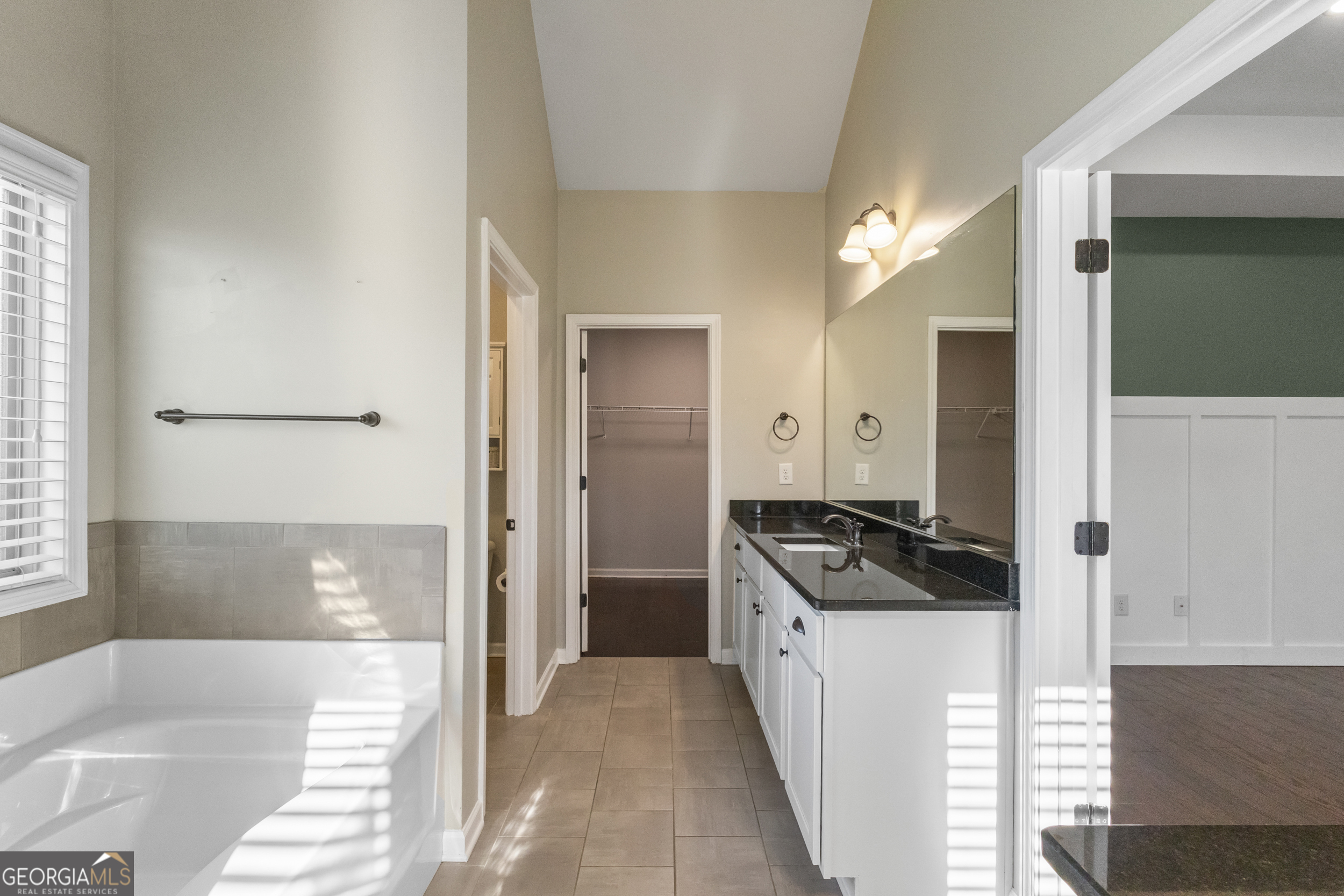 100 Wet Stone Road Senoia, GA 30276 - Photo 17 of 54 a kitchen with a sink and refrigerator