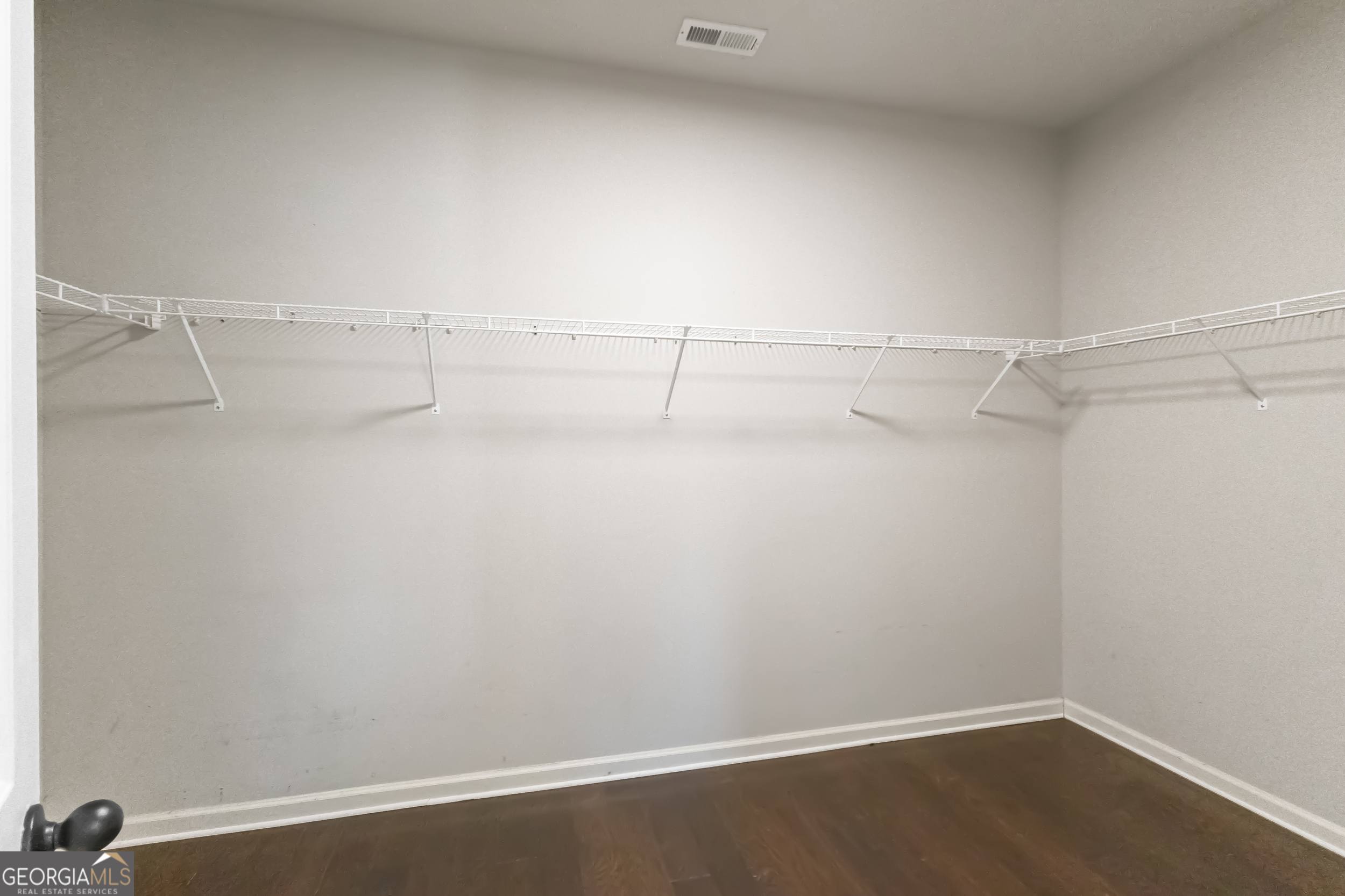 100 Wet Stone Road Senoia, GA 30276 - Photo 20 of 54 a view of a room with racks on the wall