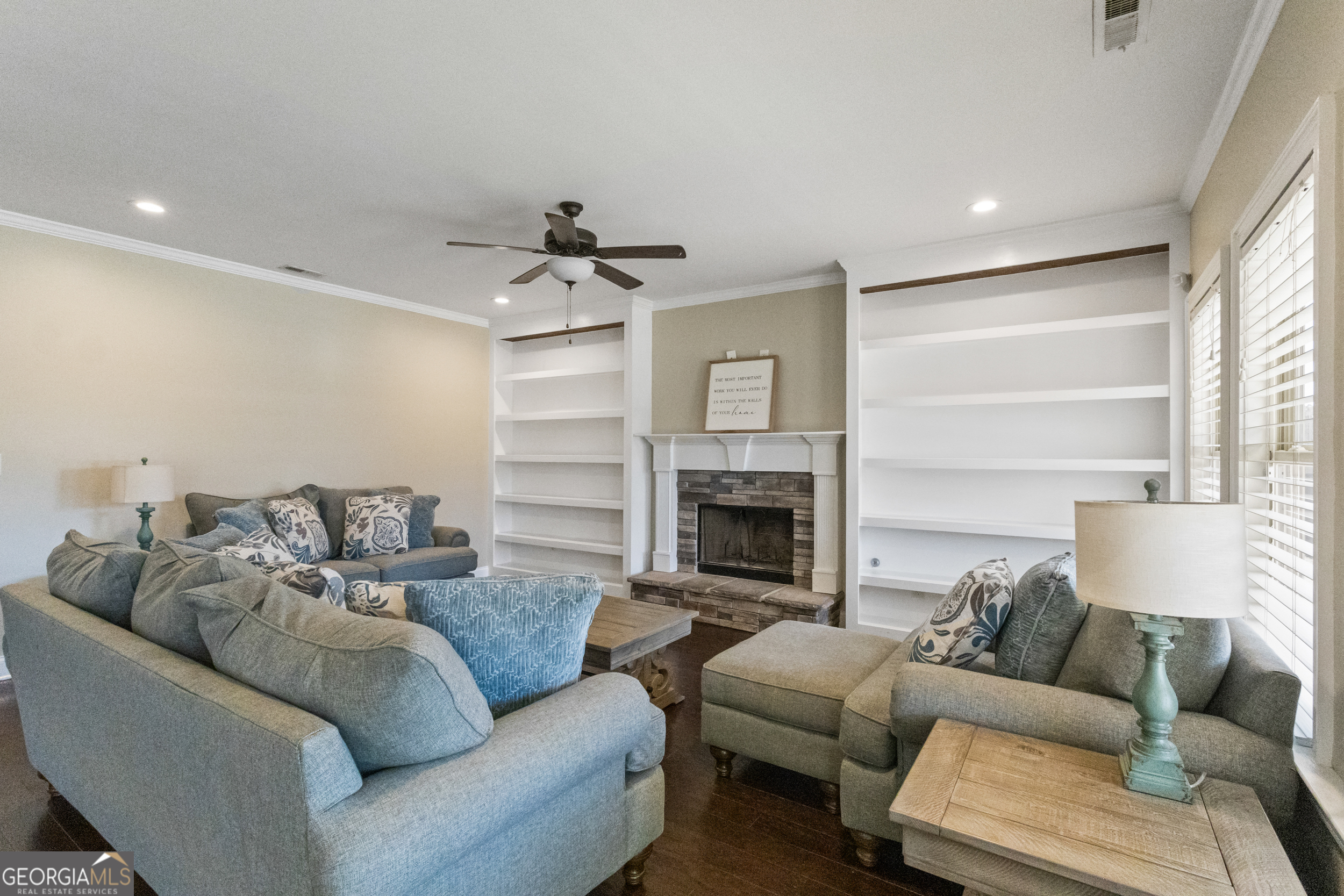 100 Wet Stone Road Senoia, GA 30276 - Photo 31 of 54 a living room with furniture and a fireplace