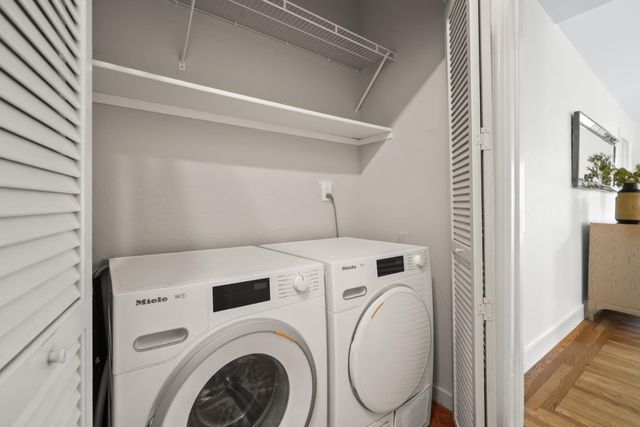 a utility room with dryer and washer