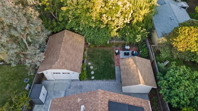 an outdoor sitting area with furniture