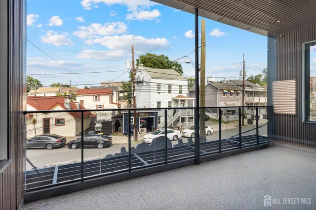 a view of a balcony with city view