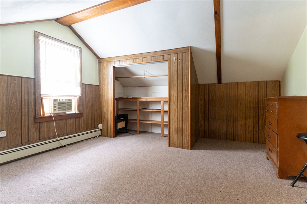 150 Framingham Road, Unit 2 Southborough, MA 01772 - Photo 17 of 20 a view of an empty room with a closet