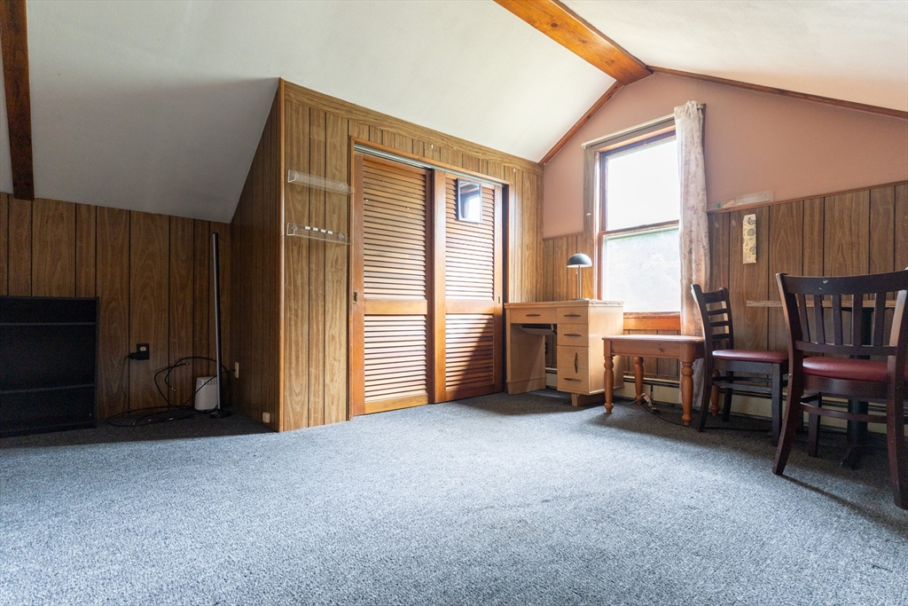 150 Framingham Road, Unit 2 Southborough, MA 01772 - Photo 20 of 20 a view of livingroom with furniture and windows