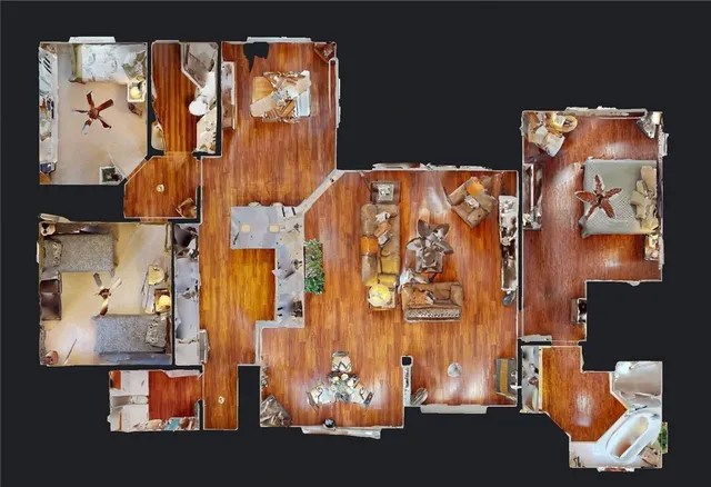 an aerial view of residential house with parking