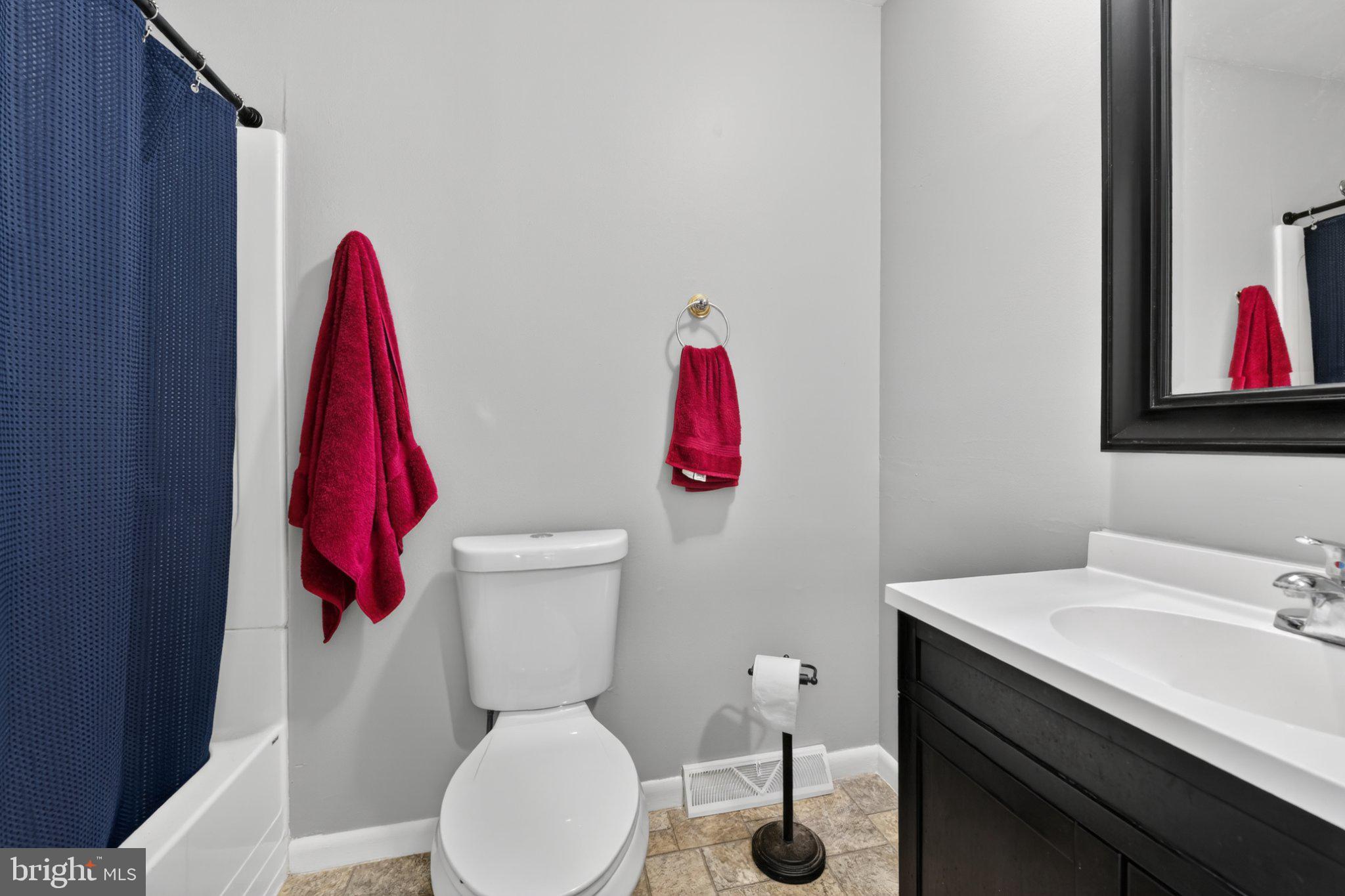 69-4 Azalea Way Reading, PA 19606 - Photo 27 of 34 Modern bathroom with vibrant accents.