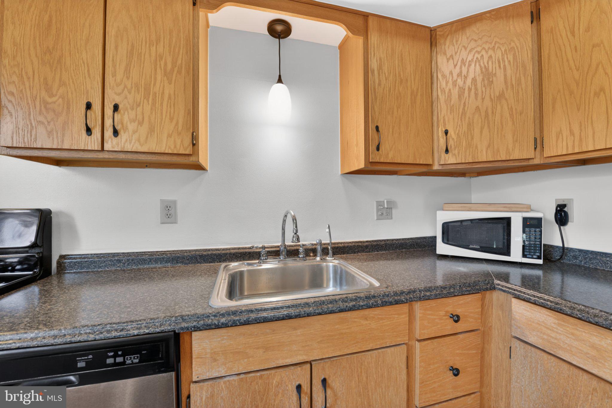 69-4 Azalea Way Reading, PA 19606 - Photo 10 of 34 Modern kitchen with sleek finishes.