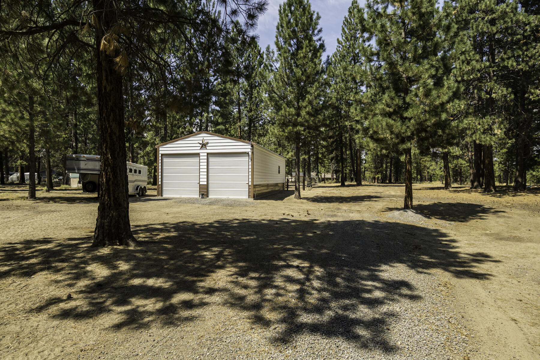 15730 Jackpine Road La Pine, OR 97739 - Photo 32 of 43 a front view of a building with a yard