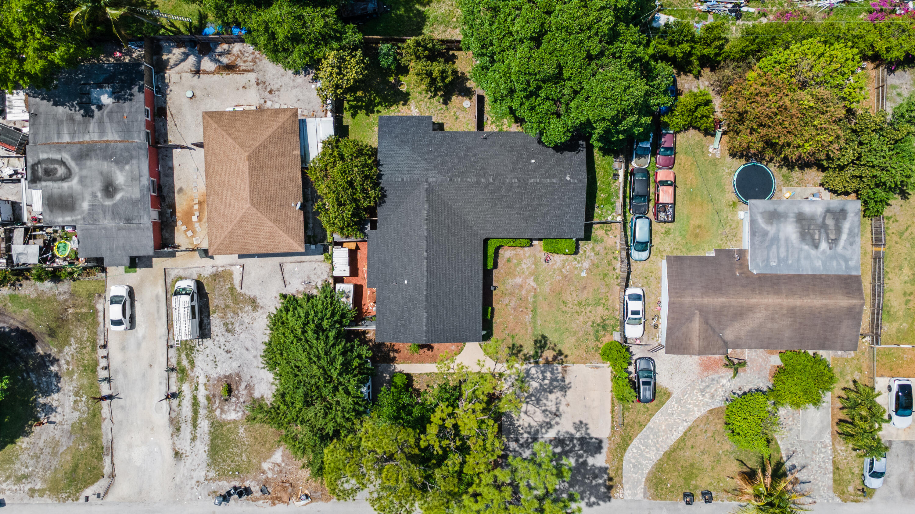 4453 Stevens Road Lake Worth Beach, FL 33461 - Photo 12 of 67 an aerial view of a house with a garden and yard