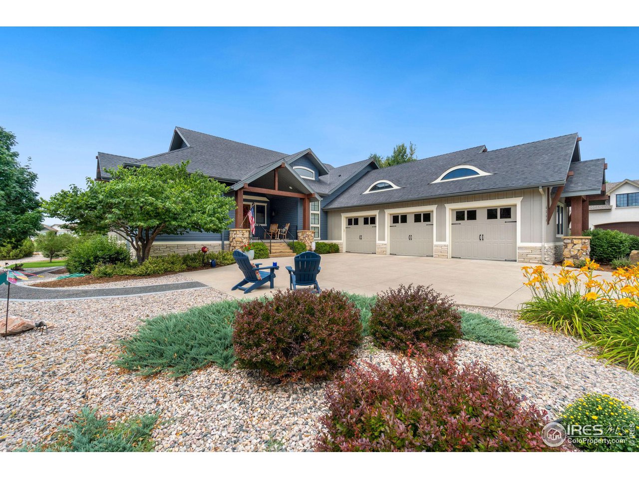 6568 Rookery Road Fort Collins, CO 80528 - Photo 1 of 16 a front view of a house with a yard