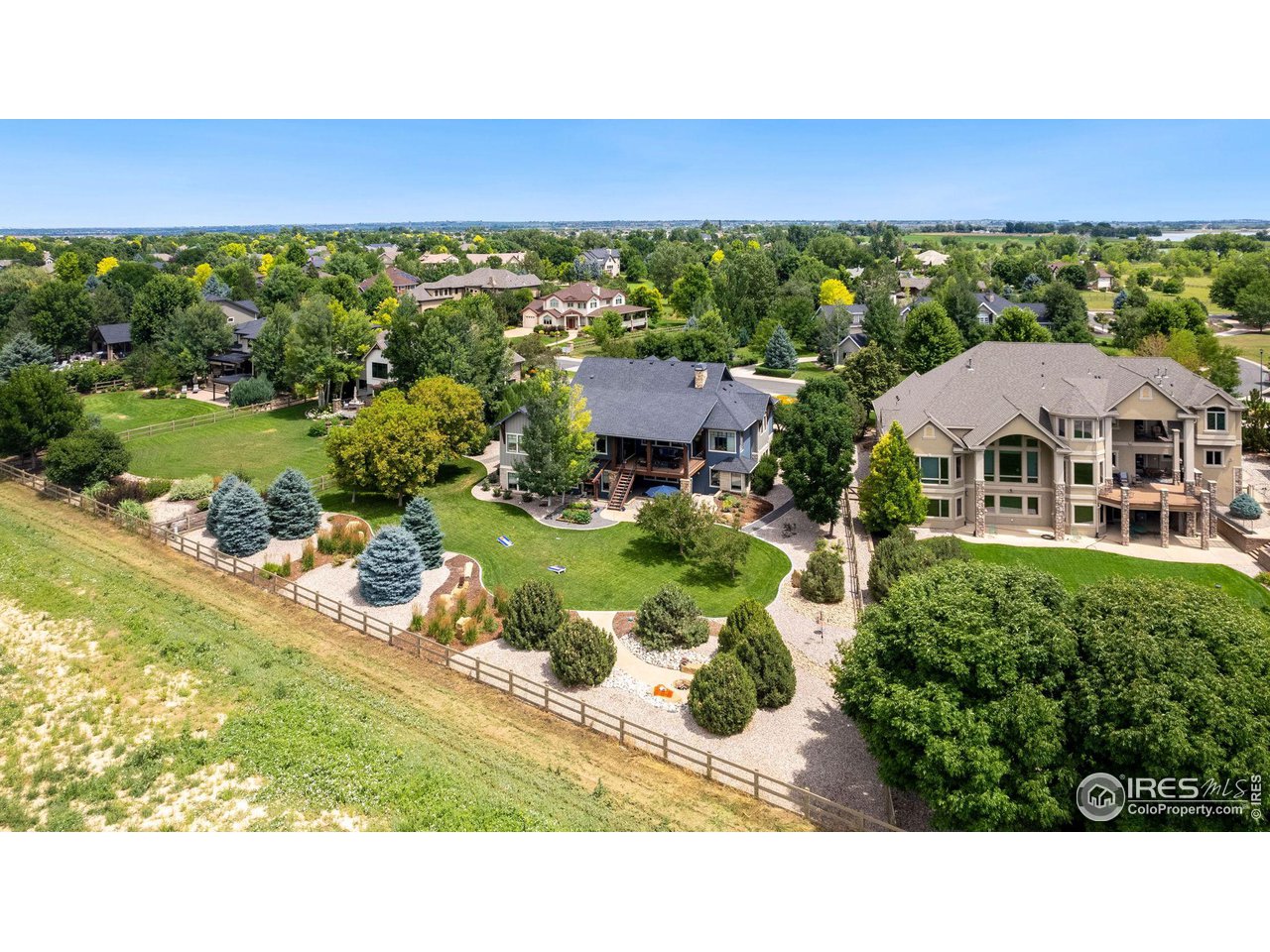 6568 Rookery Road Fort Collins, CO 80528 - Photo 16 of 16 a view of a city with a lake