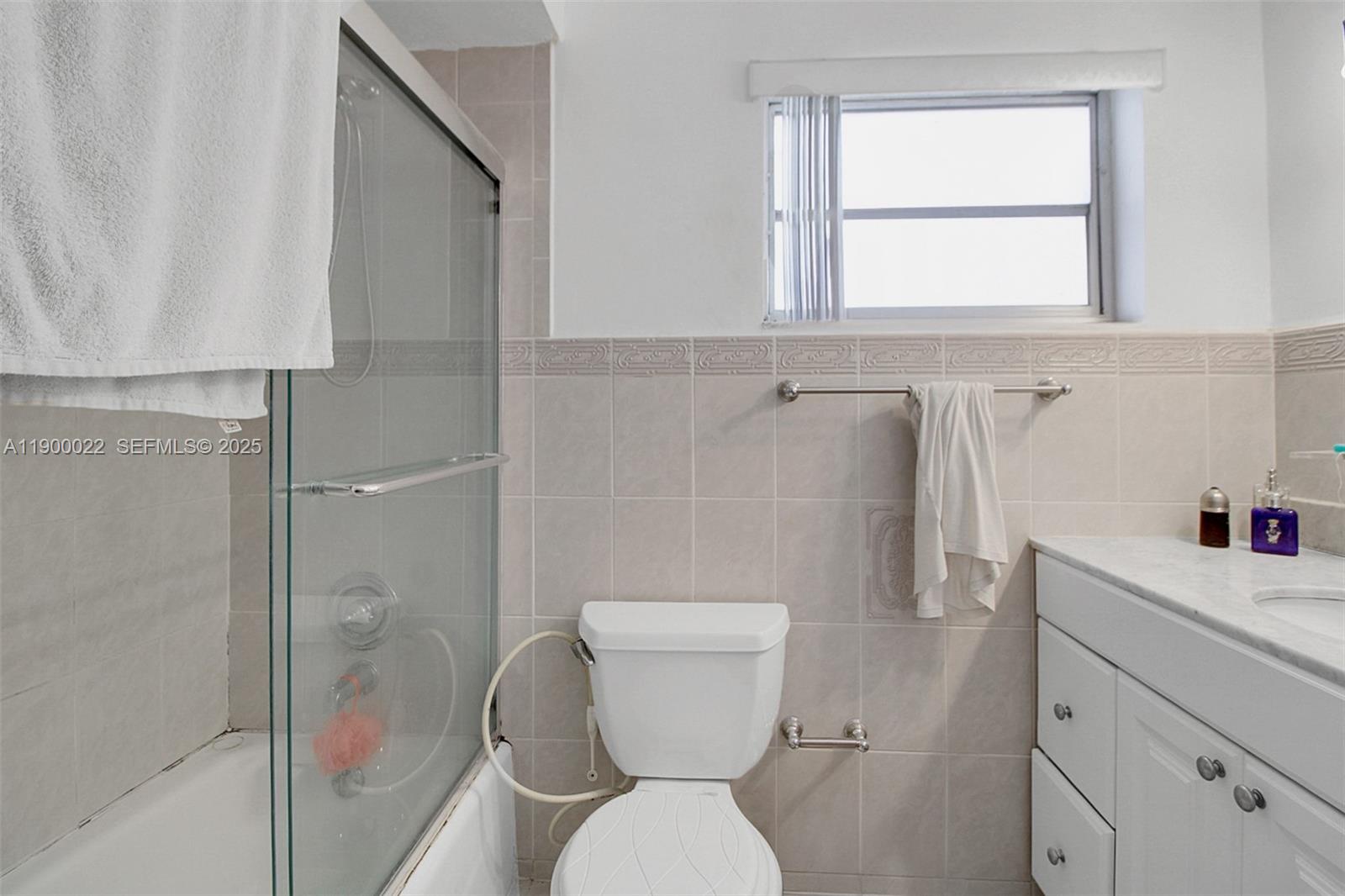 2711 Red Road Coral Gables, FL 33134 - Photo 27 of 33 a bathroom with a toilet sink and shower