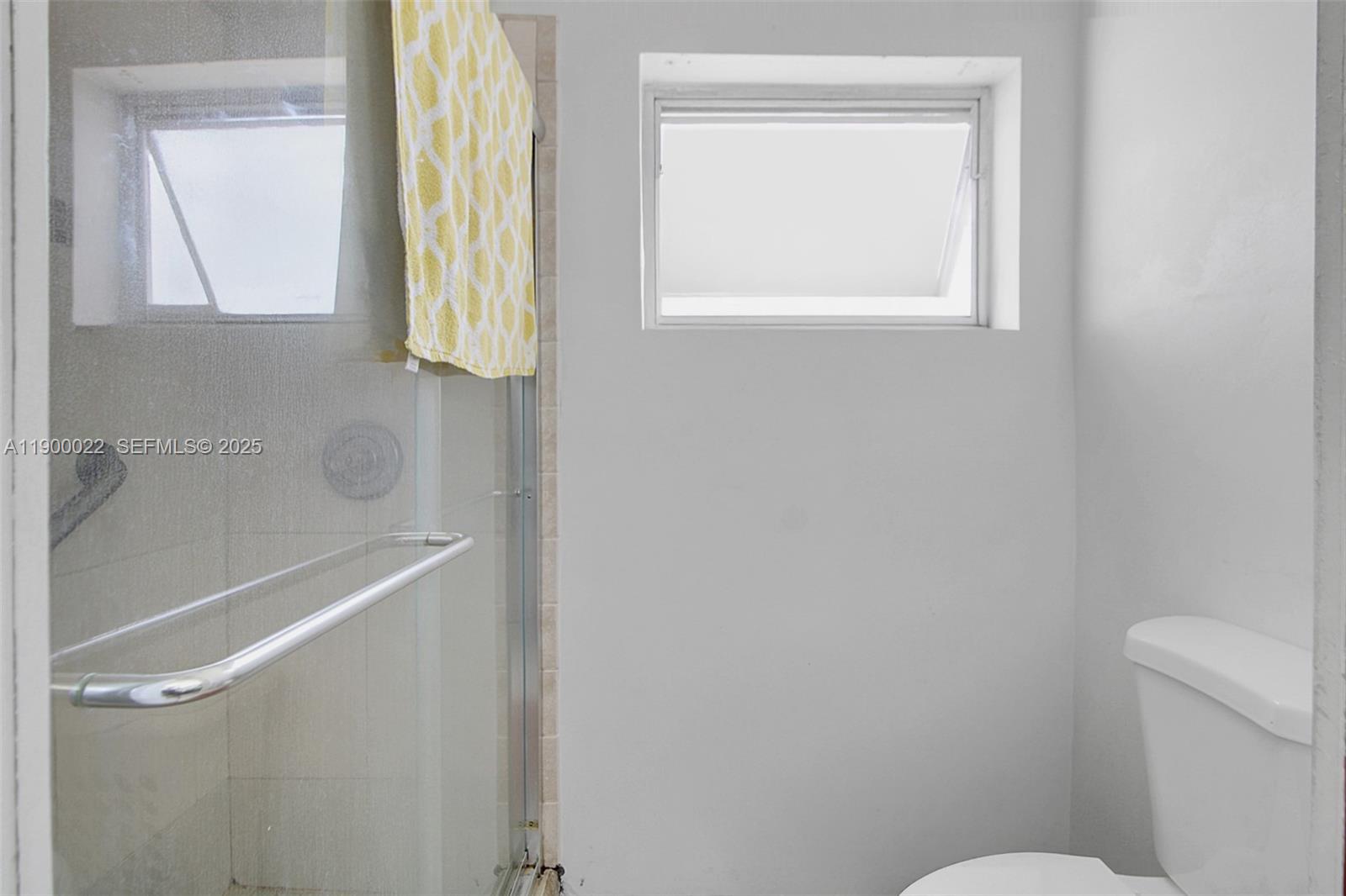 2711 Red Road Coral Gables, FL 33134 - Photo 32 of 33 a bathroom with a toilet and a sink