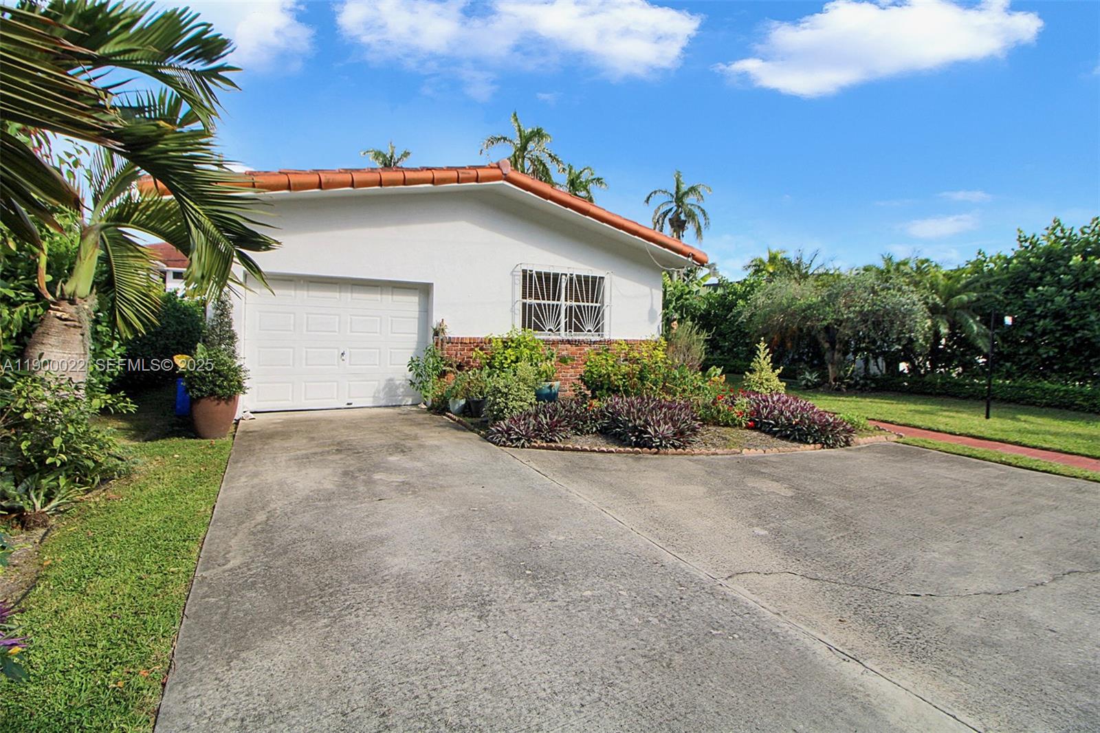 2711 Red Road Coral Gables, FL 33134 - Photo 9 of 33 a view of a house with a yard