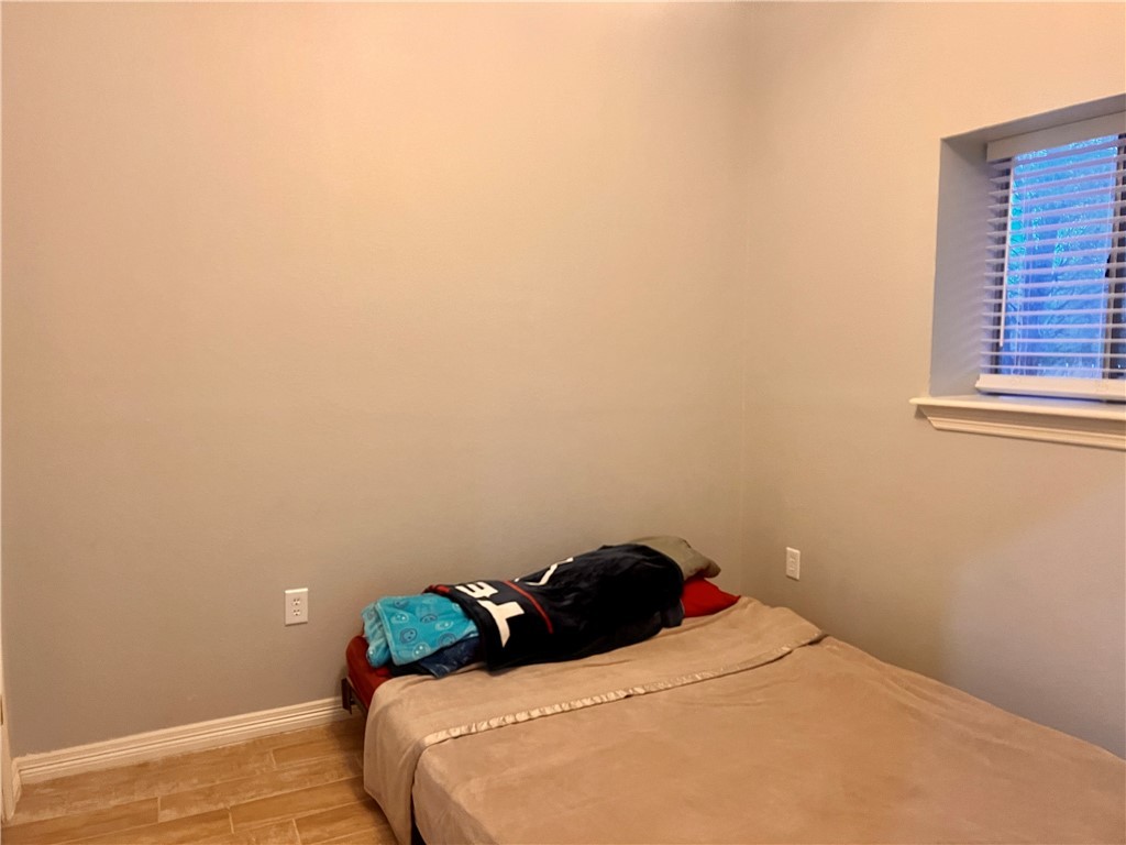 159 Lcr 904 Jewett, TX 75846 - Photo 11 of 20 a bedroom with a bed and a window