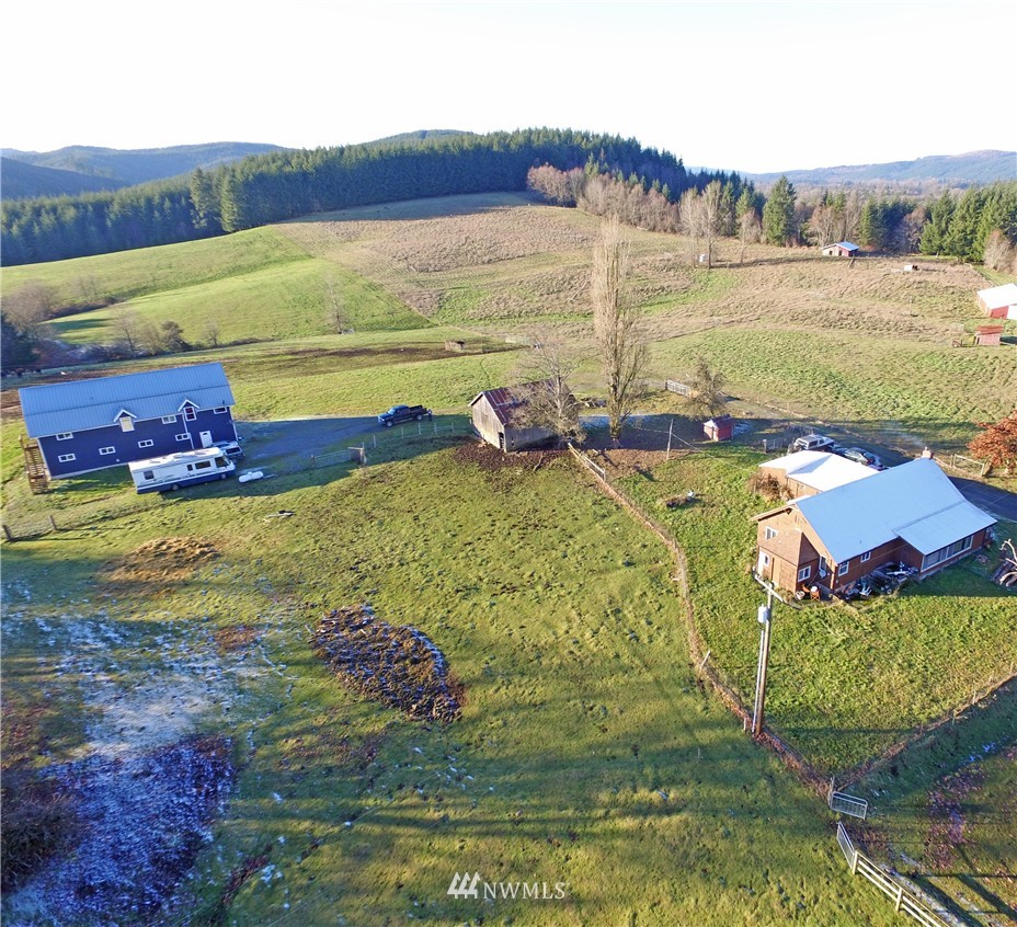 13310 201st Avenue Southwest Rochester, WA 98579 - Photo 3 of 25 a view of a lake with a yard