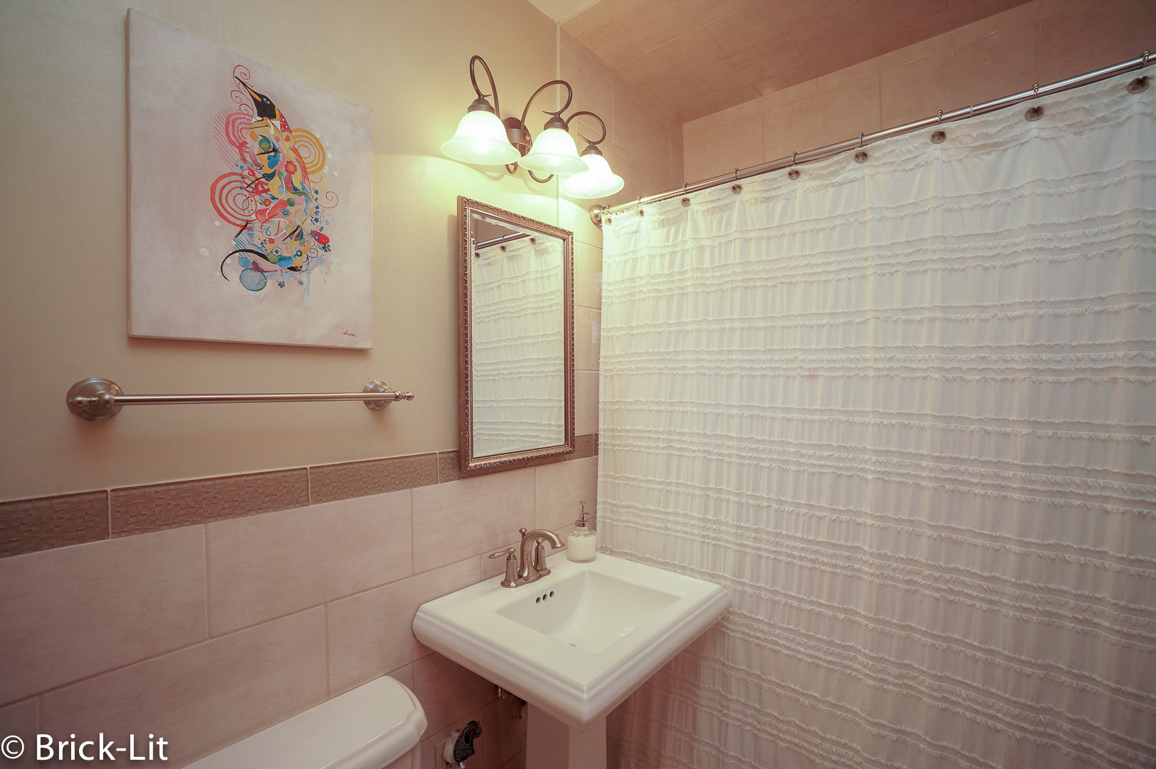 211 Gum Street New Lenox, IL 60451 - Photo 14 of 23 a bathroom with a sink a toilet and a mirror