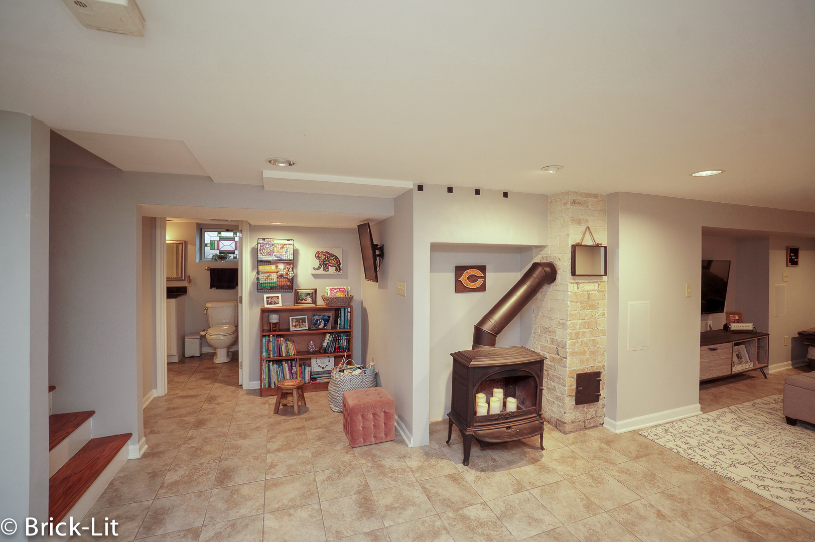 211 Gum Street New Lenox, IL 60451 - Photo 16 of 23 a view of a livingroom with wooden floor and a fireplace