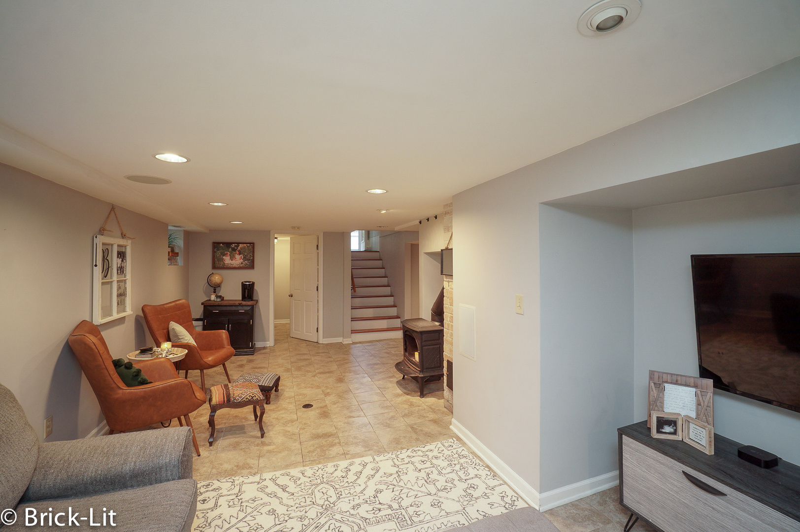211 Gum Street New Lenox, IL 60451 - Photo 17 of 23 a living room with furniture and a flat screen tv