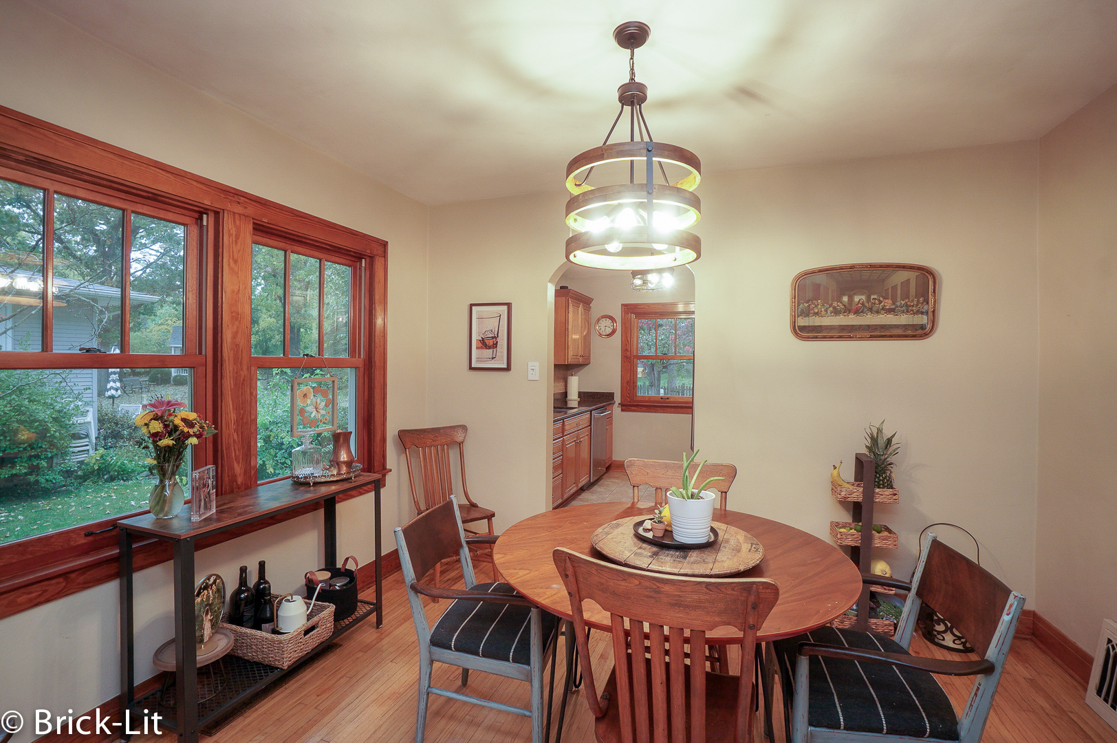 211 Gum Street New Lenox, IL 60451 - Photo 8 of 23 a view of a dining room with furniture window and wooden floor